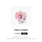 Pink enamel flower charm bead in silver setting with CZ center