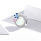 Sterling silver butterfly spring charm bead with opal-like oval center and enamel butterflies