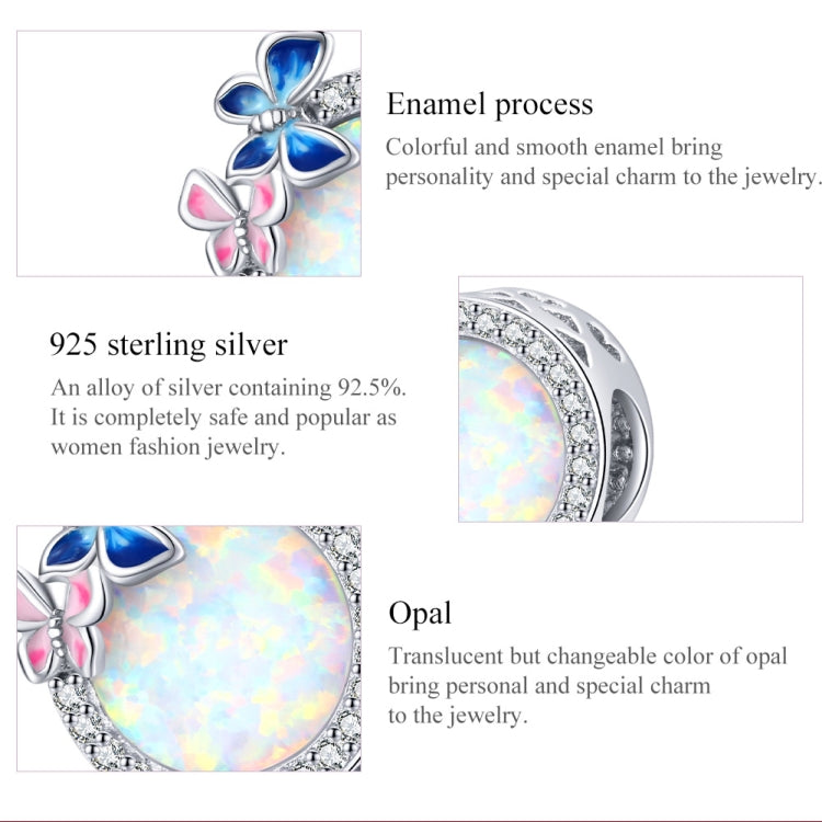 Sterling silver charm bead with opal-like oval center, blue butterfly enamel and pink accents