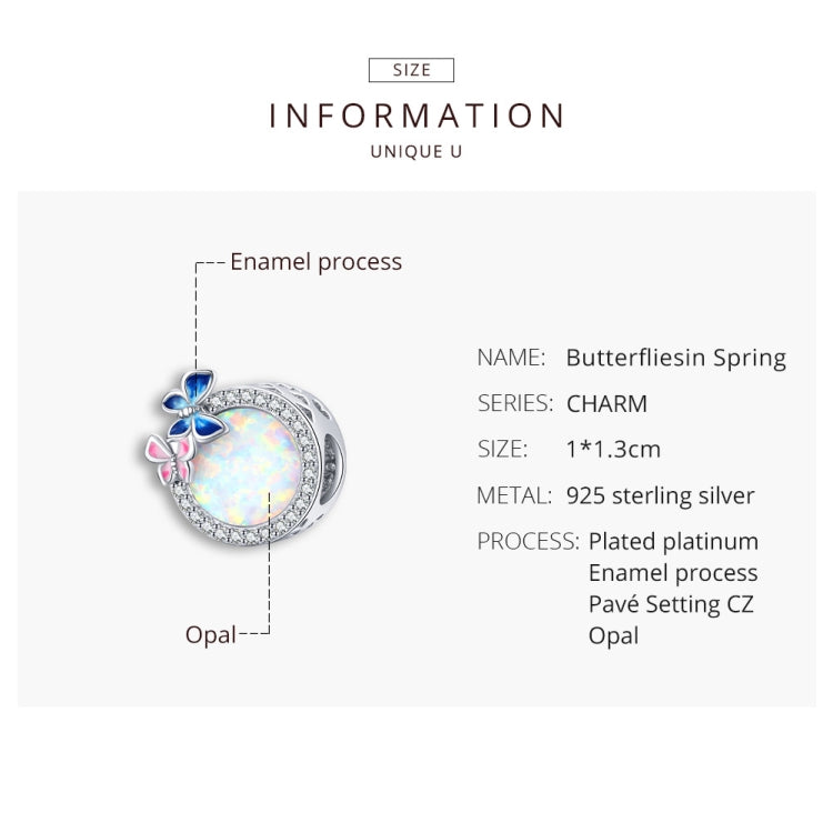 Sterling silver butterfly charm bead with opal-like round center and CZ pave border