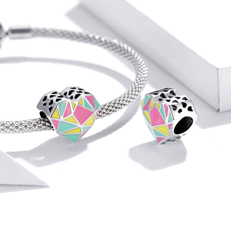 Sterling silver bead bracelet with two heart-shaped geometric enamel charm beads