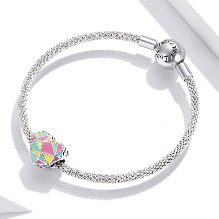 Sterling silver chain bracelet with one heart-shaped geometric enamel charm bead