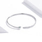 Sterling silver snake open bracelet with green-eyed snake head