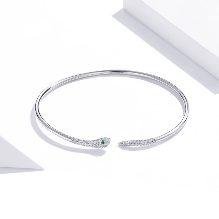 Sterling silver snake open bracelet with green-eyed snake head