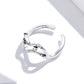 Sterling silver open wave ring with CZ stone cluster and inner S925 marking