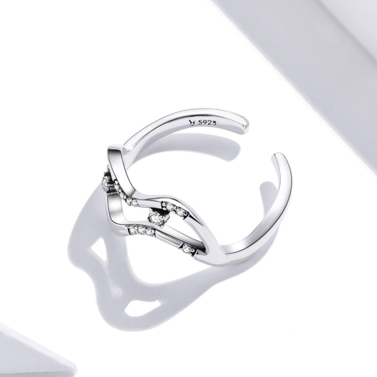 Sterling silver open wave ring with CZ stone cluster and inner S925 marking