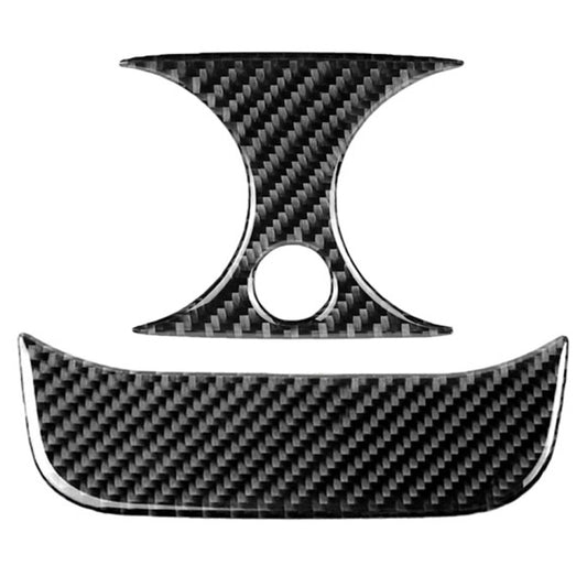 Two-piece carbon fiber-look rear air outlet trim with central round opening, black