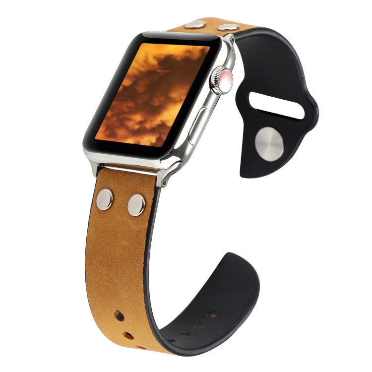 Brown leather watch strap with metal buckle and perforated holes