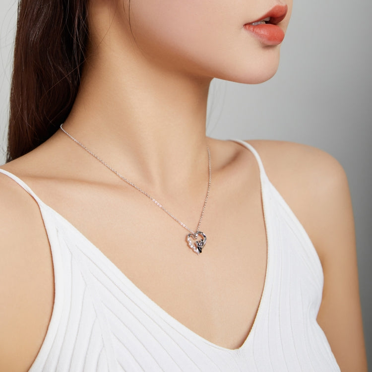 Heart panda necklace on model with thin silver chain and heart-shaped panda pendant