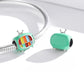 Sterling silver charm bead with green TV enamel and multicolor striped front