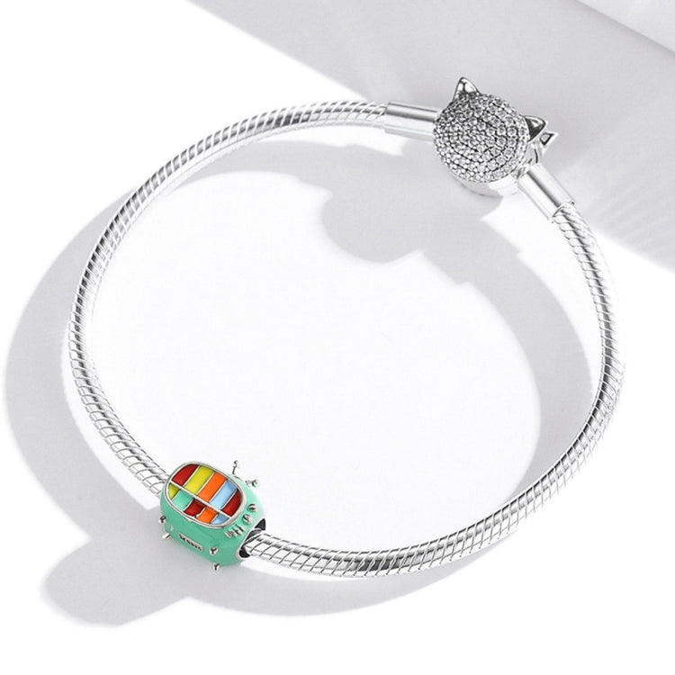 Silver snake-chain bracelet with green TV charm bead