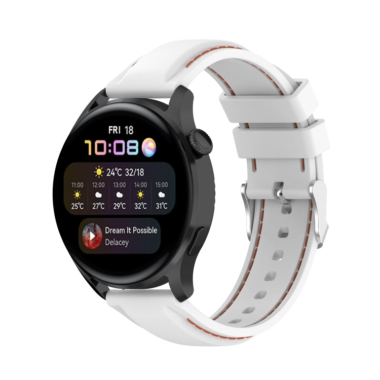 22mm silicone watch strap in white with orange stitching, paired with a smartwatch