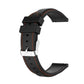 22mm silicone watch strap in black with orange stitching and silver buckle