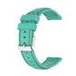 Light teal silicone watch strap with red stitching, perforated holes and silver clasp