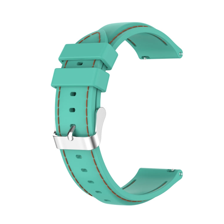 Light teal silicone watch strap with red stitching, perforated holes and silver clasp