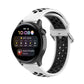 Sport silicone watch strap with metal clasp, white with black perforations, on smartwatch