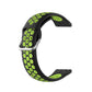 Two-color silicone watch strap, black with lime green dot pattern and metal buckle, 22mm.