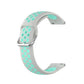 Two-color silicone watch strap, white with mint green dot pattern and metal buckle, 22mm.