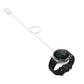White magnetic smartwatch charger cable with round puck and charger base on watch