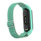 Sea green woven strap with zigzag texture and metal buckle for fitness tracker smartwatch band.