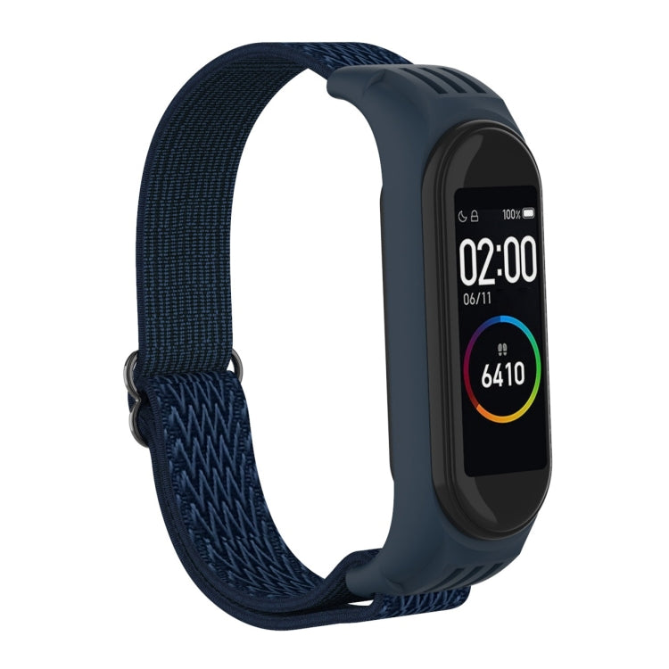 Midnight blue woven watch strap with zigzag pattern and metal buckle loop for fitness tracker.