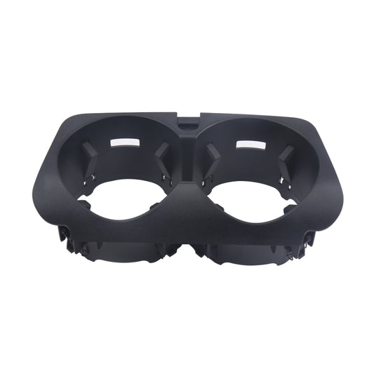 Black dual cup holder insert with two circular openings for car dashboard