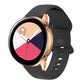 Dark gray silicone smartwatch band with perforated interior buckle, adjustable strap.
