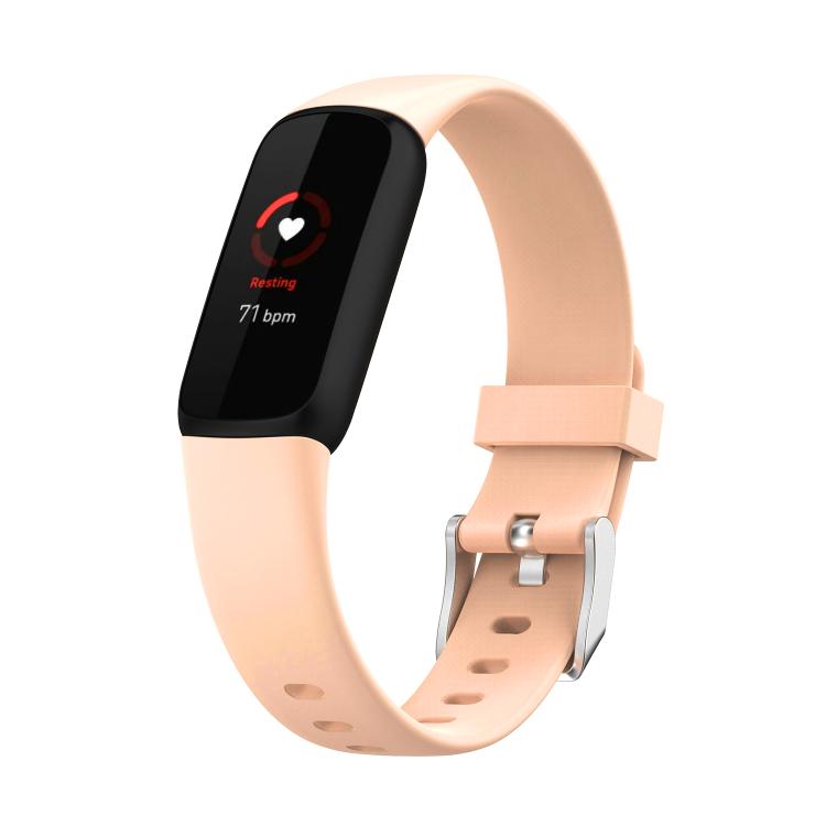 Light peach silicone smartwatch band with buckle and perforations; dark fitness display shown.