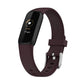Dark purple silicone smartwatch band with buckle and perforations; dark fitness display shown.