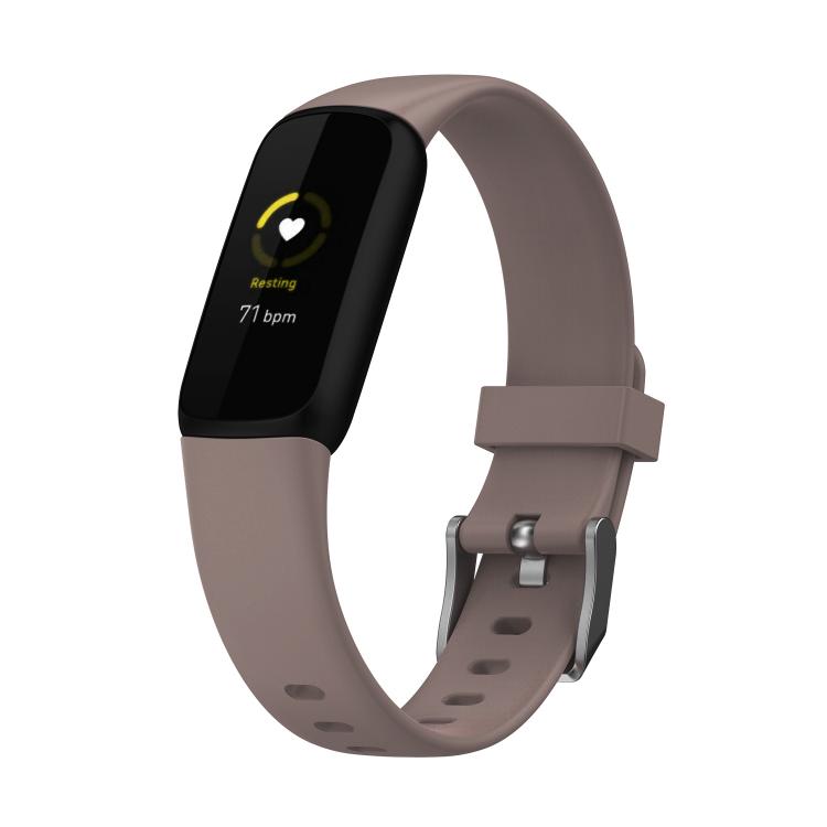 Pine green silicone Fitbit-style watch band with adjustable buckle and perforation holes