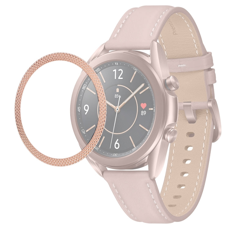 Rose-gold rhombus-textured bezel ring accessory on smartwatch with light pink strap
