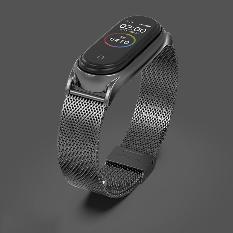 Gunmetal gray Milanese watch band with metal clasp and black smartwatch