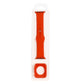 Red-orange silicone watch strap with matching protective case insert, in retail packaging