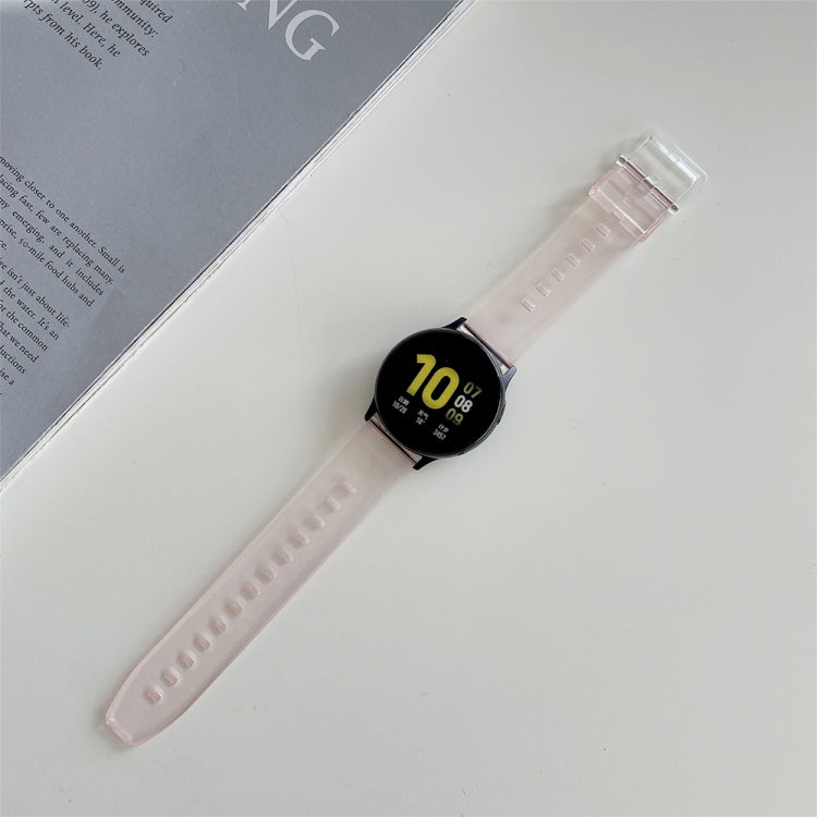 22mm pink silicone smartwatch replacement strap with clear clasp, on black fitness watch