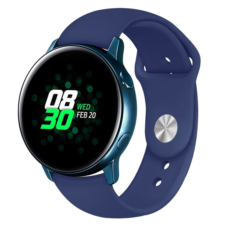 Indigo silicone smartwatch wrist strap with pin holes and metal keeper on watch