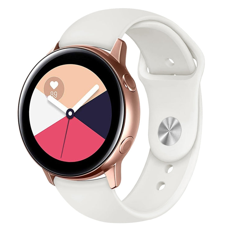 Cream-white silicone smartwatch band with metal clasp plate and buckle holes