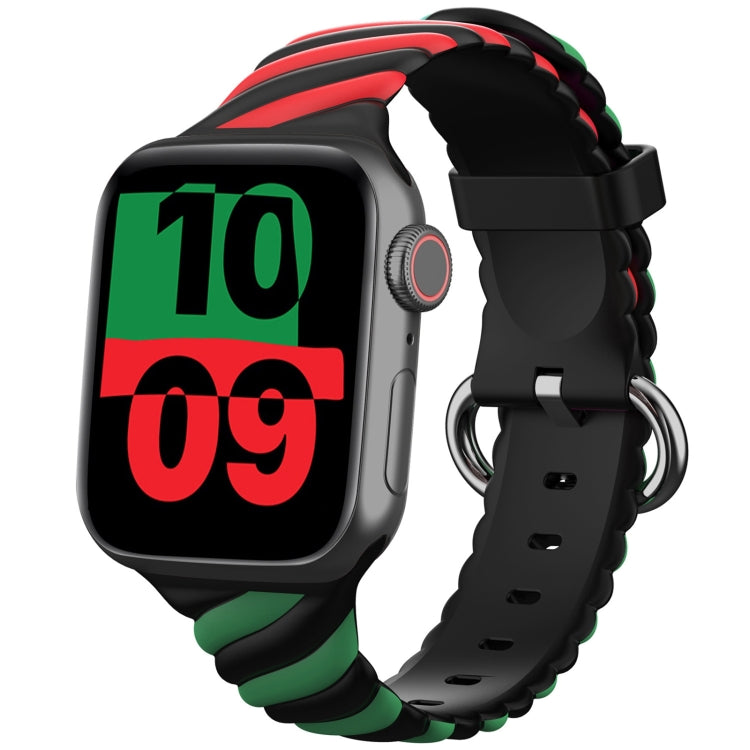 Two-tone silicone watch strap with black base and green accents, metal ring buckle