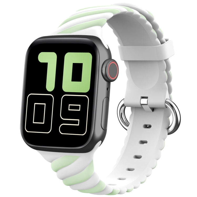 Two-tone silicone watch strap with white base and light green accents, metal buckle ring
