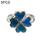 Adjustable open ring with four blue heart gems and crisscross silver frame