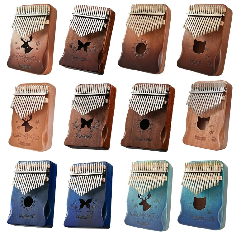 Set of colored wooden 17-tone kalimbas with metal tines and round sound holes
