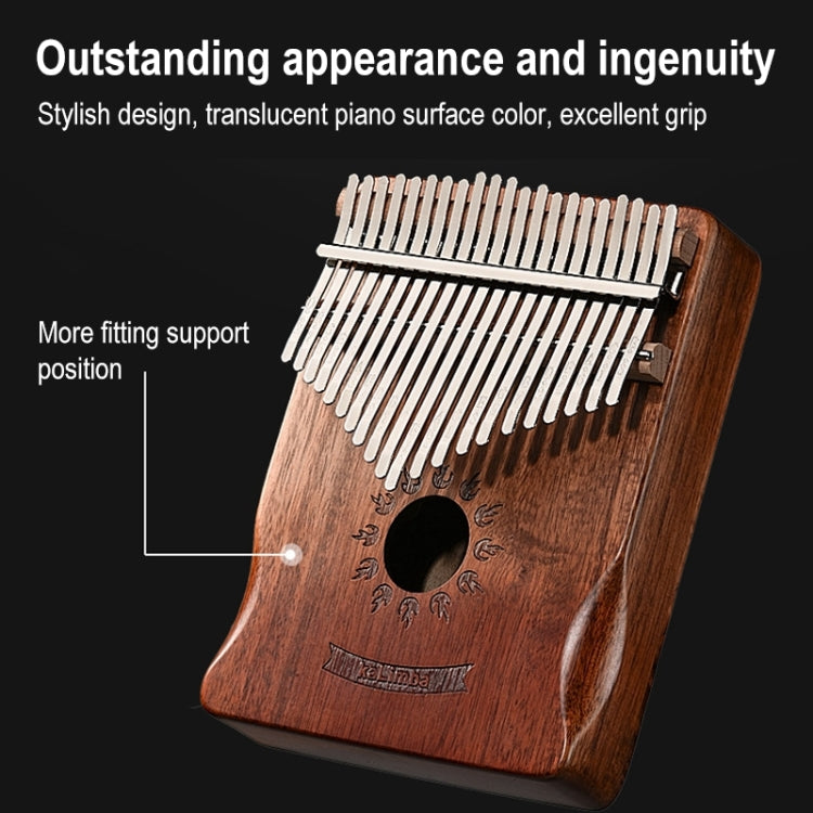 Brown wooden 17-tone kalimba thumb piano with metal tines and round sound hole