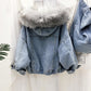 Light blue denim jacket back view with white faux fur hood trim and gathered hem.
