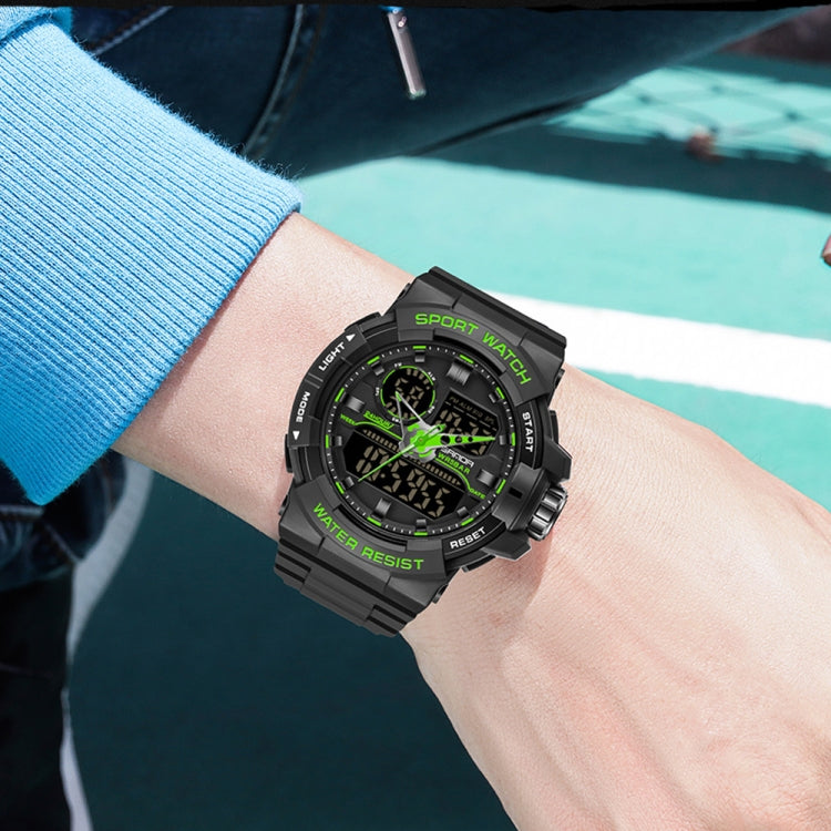 Sports wristwatch on wrist, black band with green dual digital face