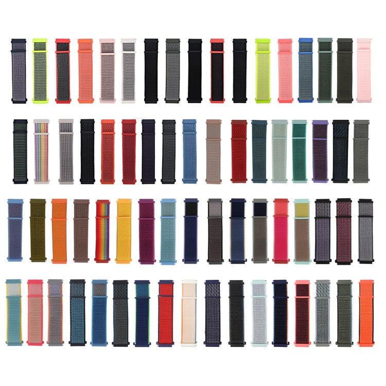 Set of nylon loop watchband straps in multiple colors, neatly arranged