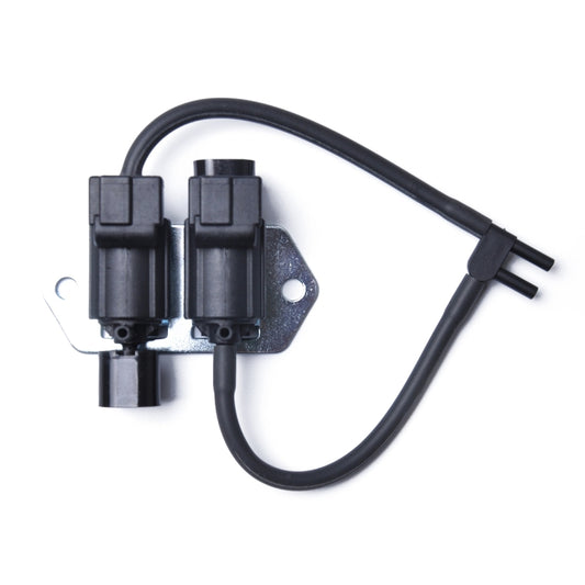 EGR valve control solenoid with twin black connectors and attached hoses