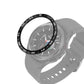 Black smartwatch bezel ring with white engraved minute markings around the watch display
