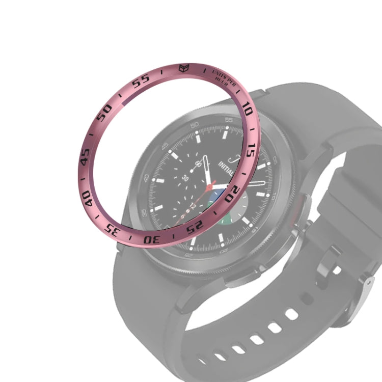 Rose pink smartwatch bezel ring with black engraved minute track around the display