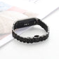 Black seven-bead stainless steel watchband with smartwatch side view