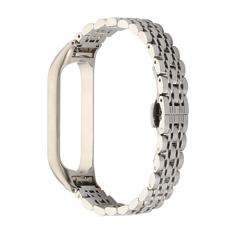 Silver seven-bead stainless steel watchband with oval metal link pattern