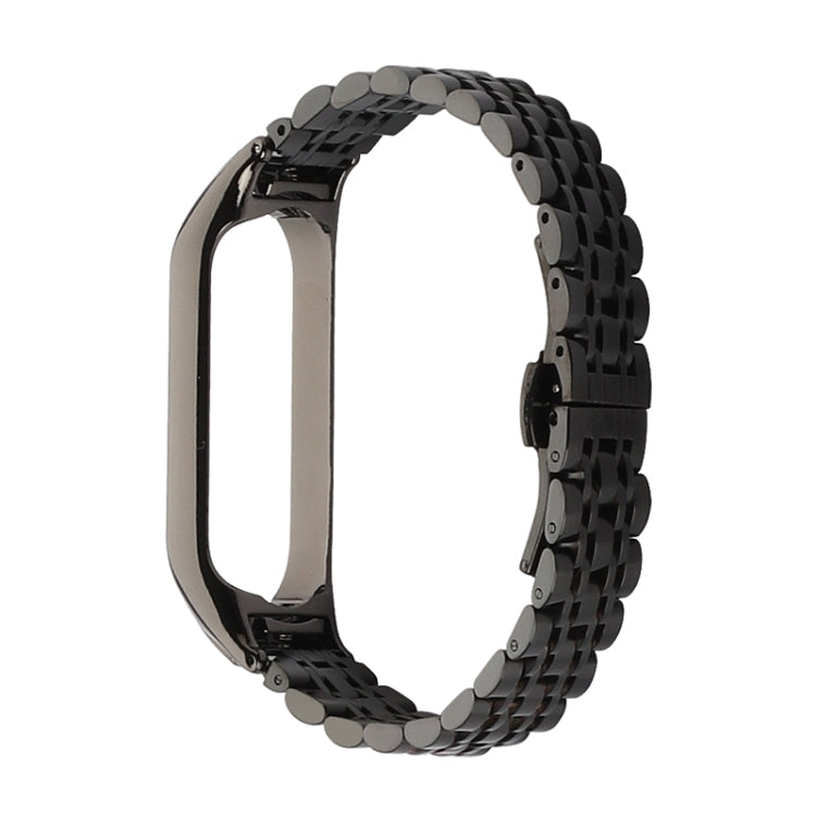 Seven-bead stainless steel watch strap, black braided link rows with clasp.